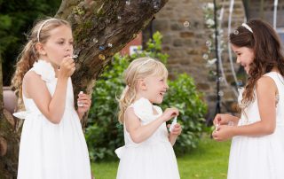 Destination Sitters wedding children playing at a wedding.